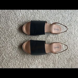 Black sandals with back